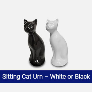 White and black sitting cat cremation urn for pet memorial services at Austin TX veterinary hospital
